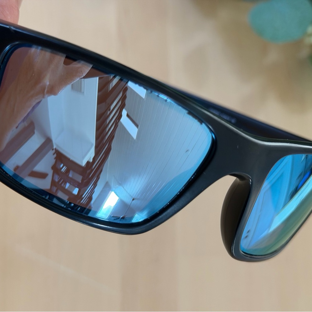 Oakley Fuel Cell Matte Black Sunglasses with Ice Blue Polarized Lenses - Picture 11 of 12